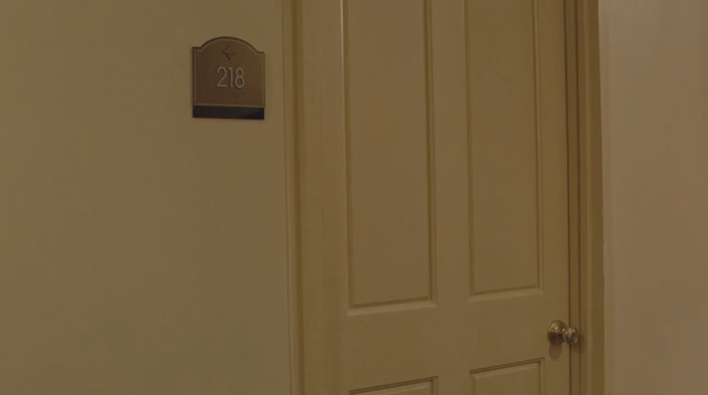 Room 218 in Ruth Davenport's apartment building.
