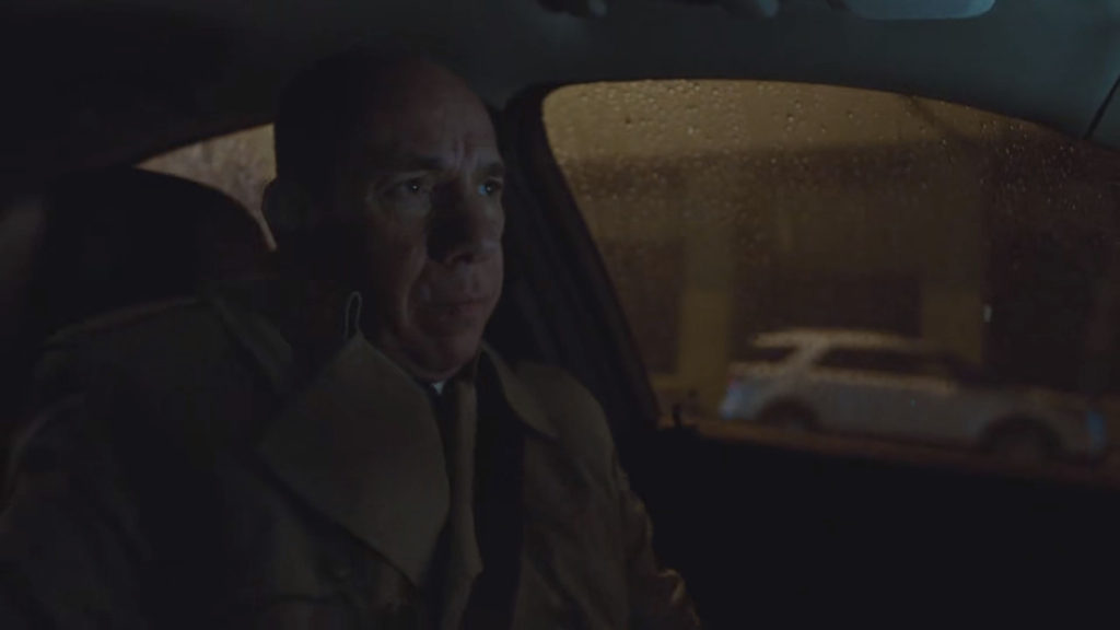 Albert Rosenfield driving in the rain.