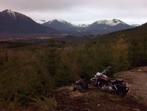 James Hurley and his motorcycle at the mountain overlook.