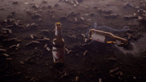 Cigarettes and beer bottles on the Floor