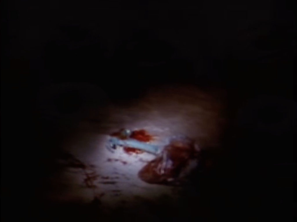 Bloody Hammer on Train Car Floor from Episode 2001