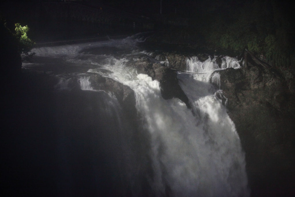 The top of Snoqualmie Falls at night.