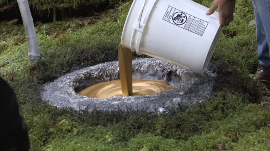 Pouring the gold paint