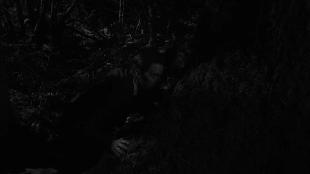 Cooper hiding behind the tree in Part 17