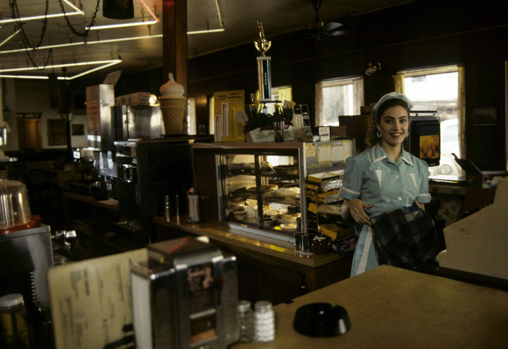 Shelly Johnson behind the counter