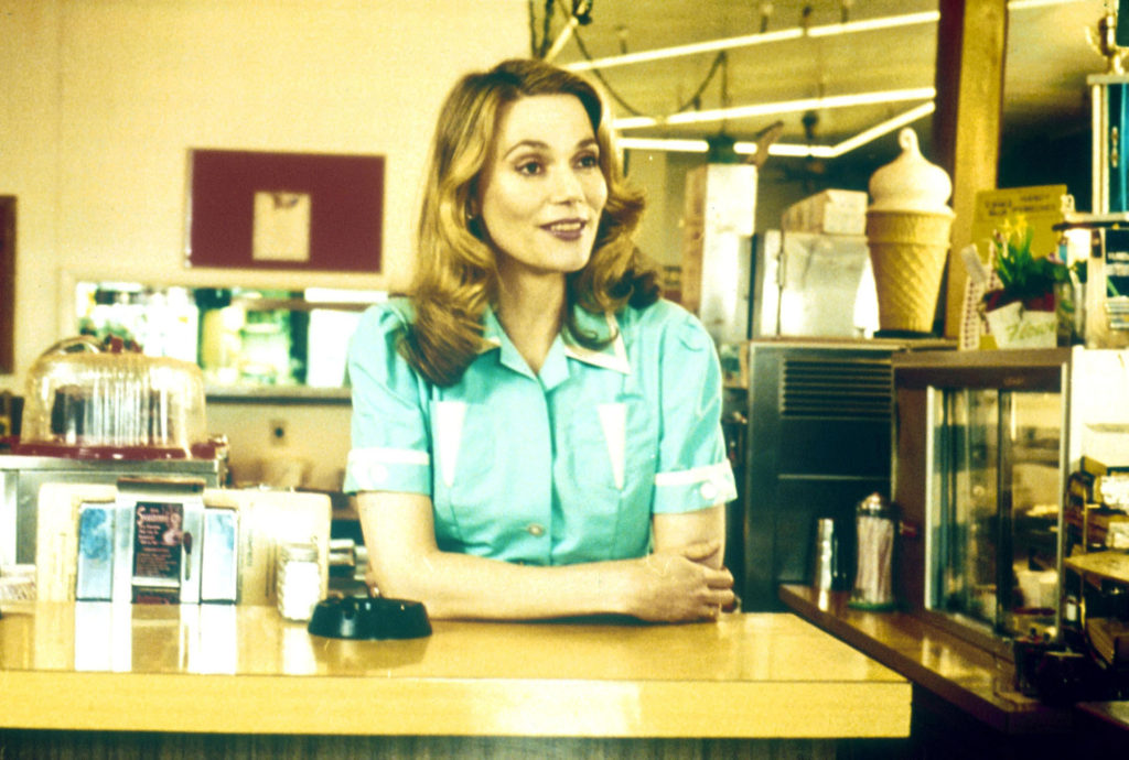 Norma behind the counter