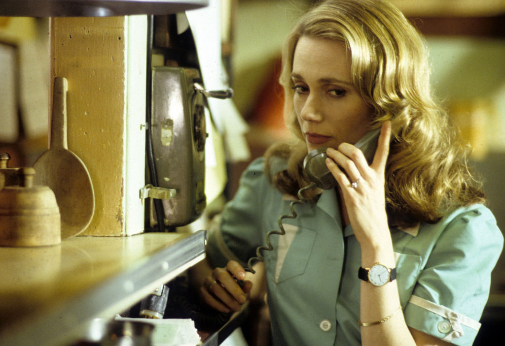 Peggy Lipton behind the counter