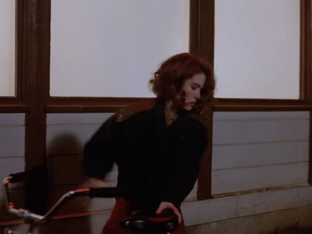 Donna Hayward with Harriet's Bike in the Pilot Episode