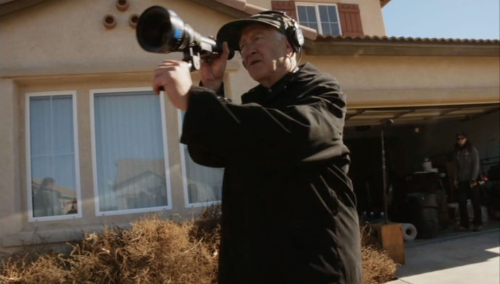 David Lynch with lens in "Tell It Martin"