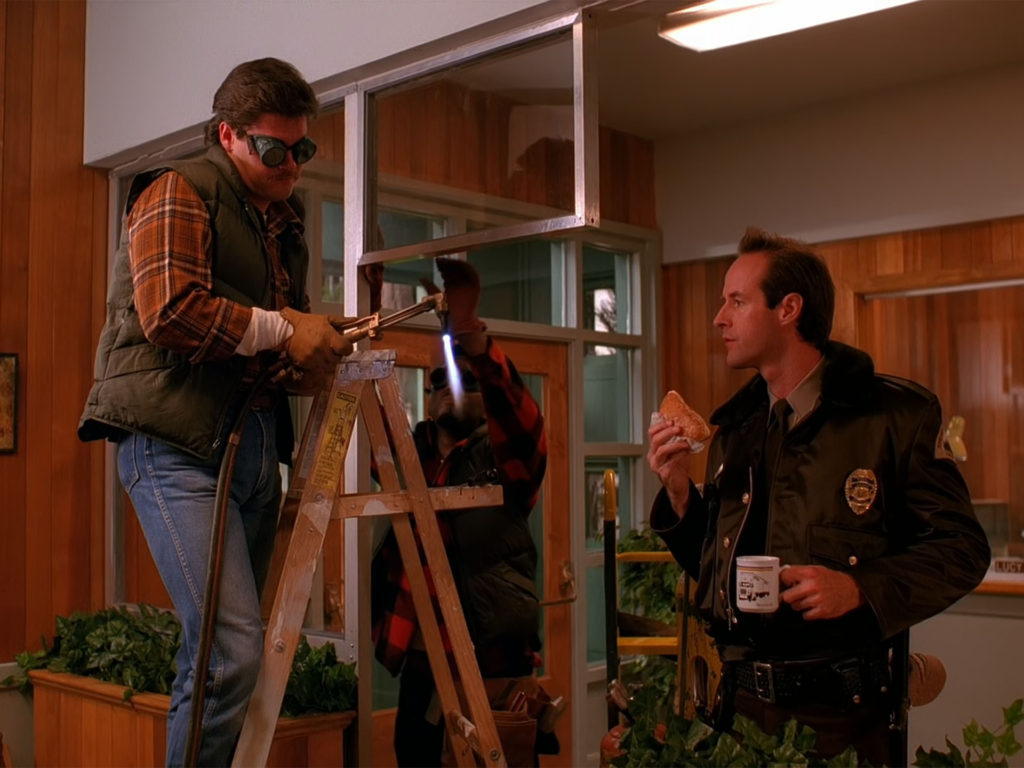 Deputy Andy Brennan holds the mug in Episode 1001