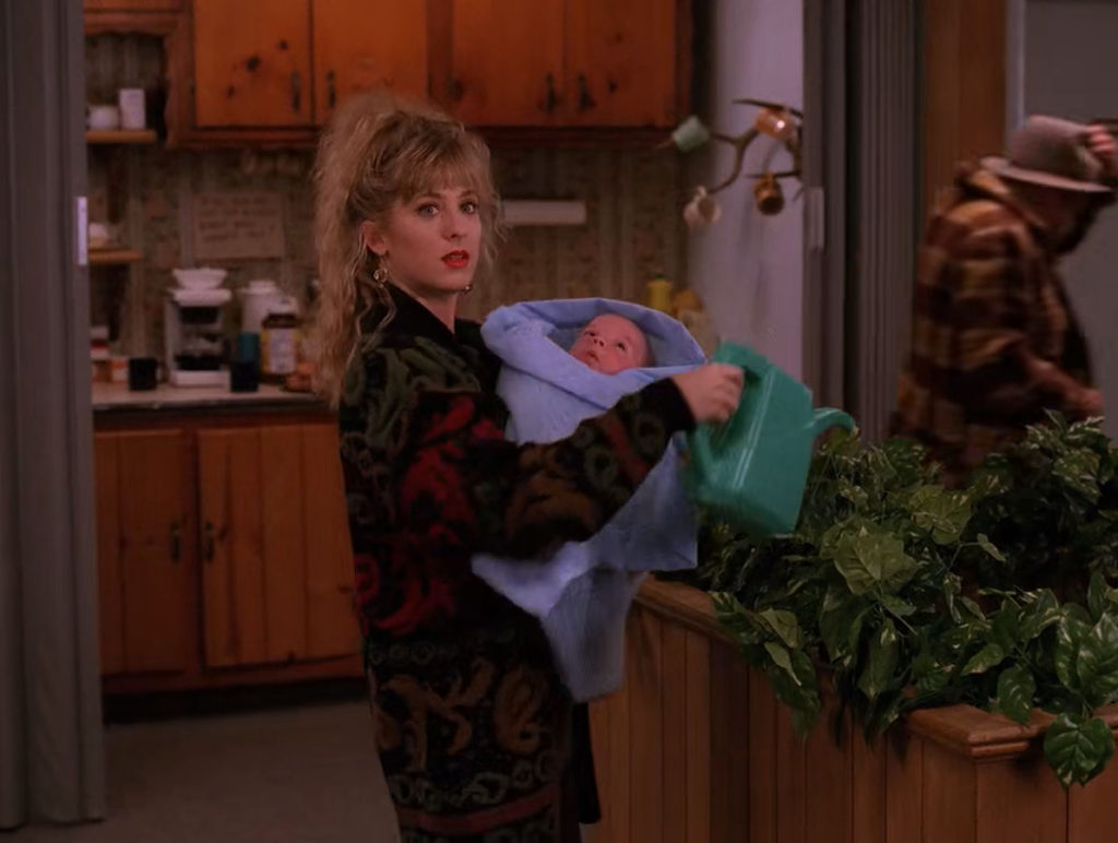 Lucy Holding Gwen's Baby