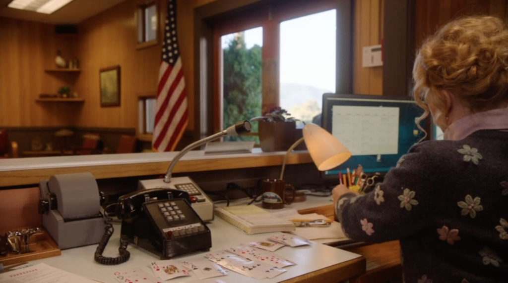 Lucy at the front desk of the Twin Peaks Sheriff's Department